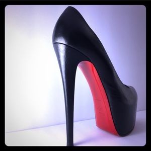 Six inch black leather Christian Louboutin’s!